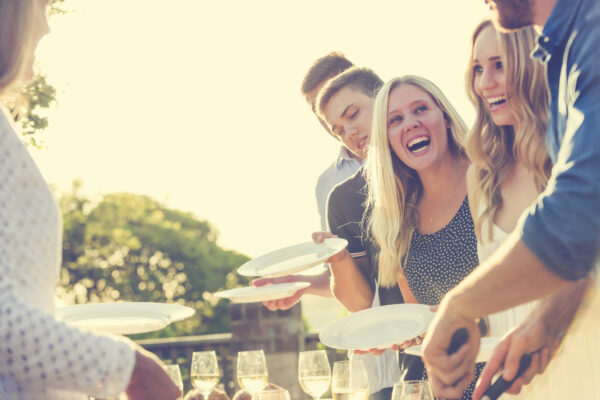 Group of teenagers eating outdoors healthy after school snacks for teens